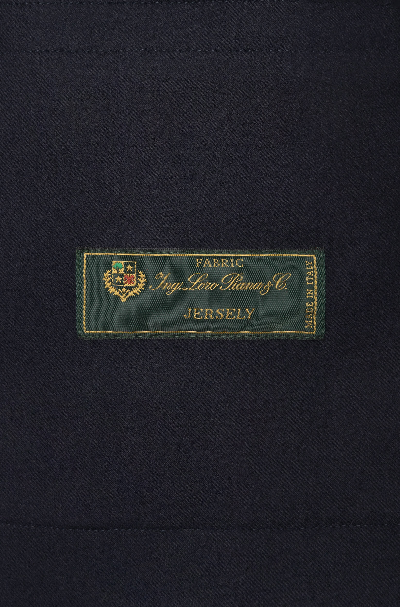 Étiquette Loro Piana du blouson en laine mérino marine