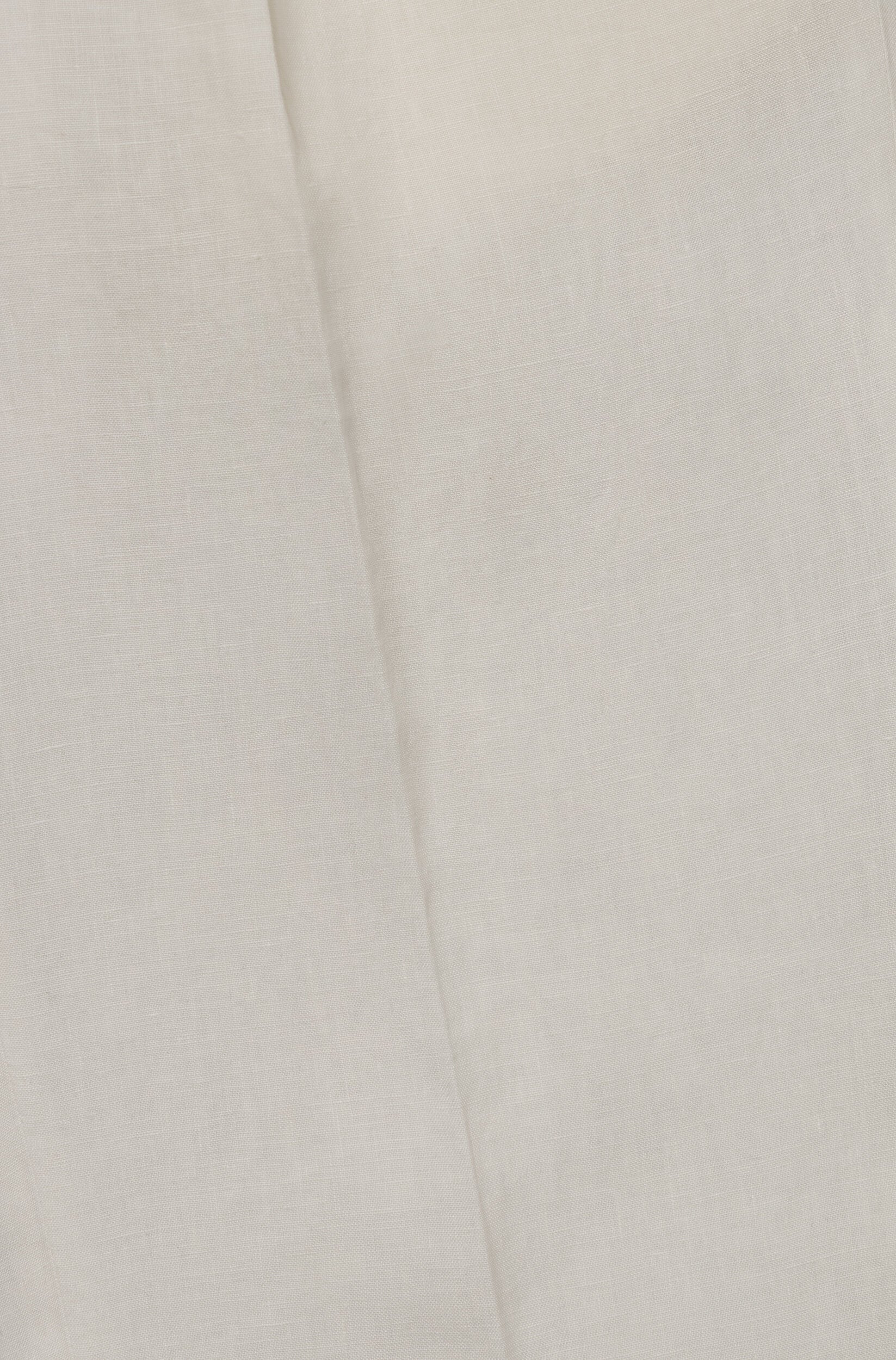 Zoom sur le tissu en lin blanc