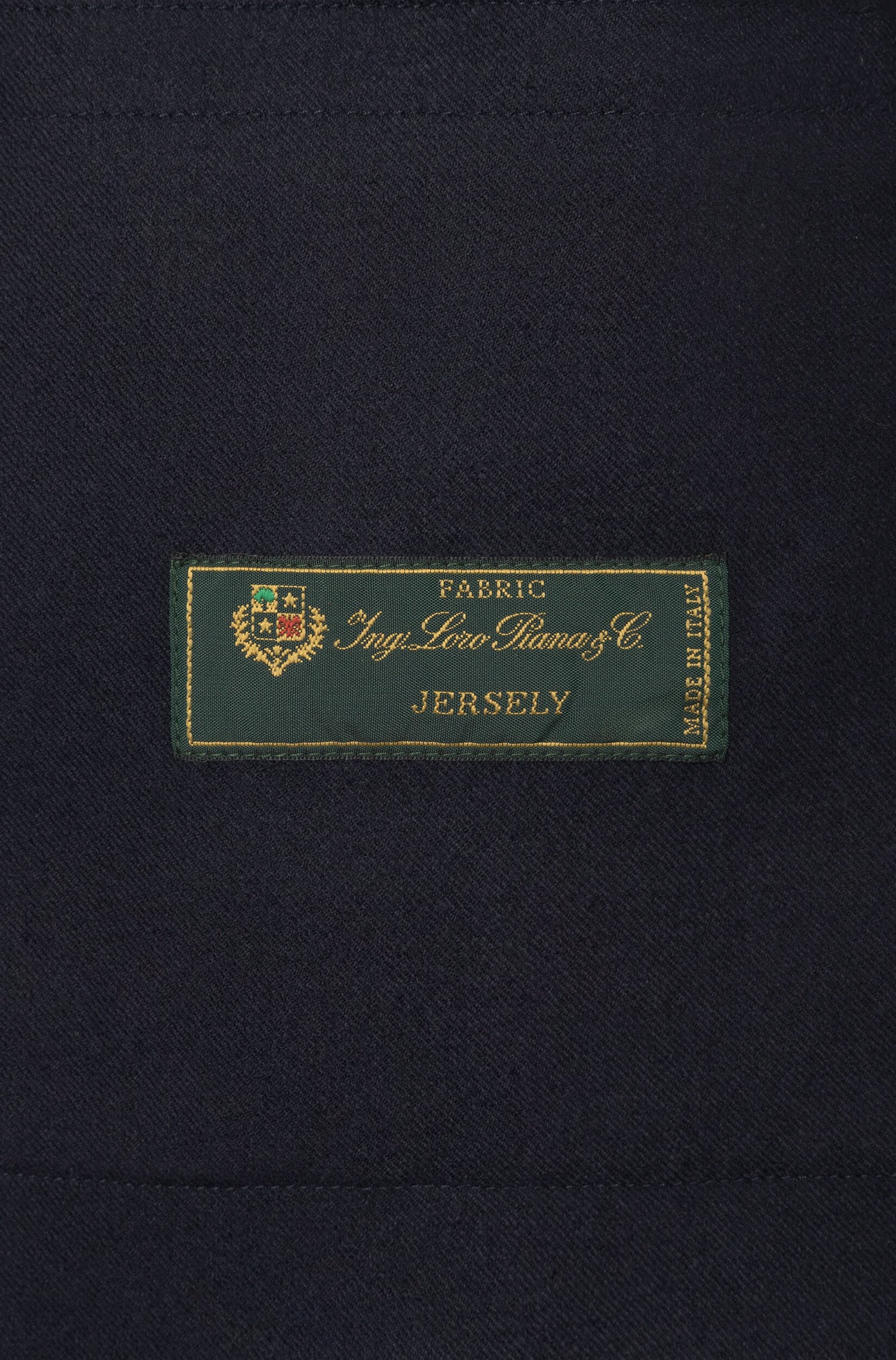 Étiquette Loro Piana du blouson en laine mérino marine