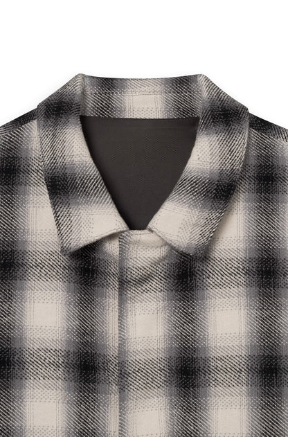 Col de la veste en coton avec motif à damier blanc et noir pour homme