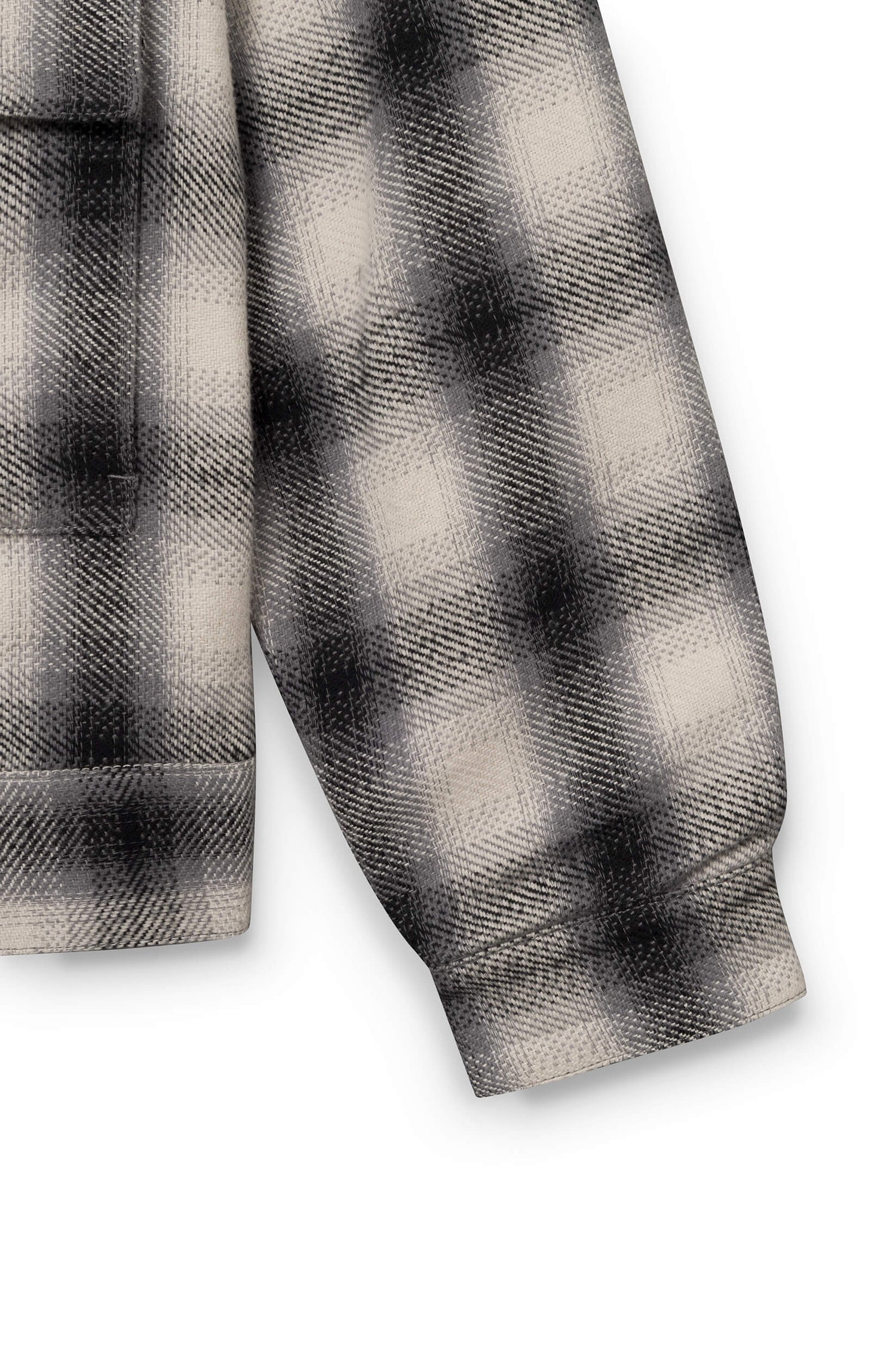 Manche de la veste en coton avec motif à damier blanc et noir pour homme