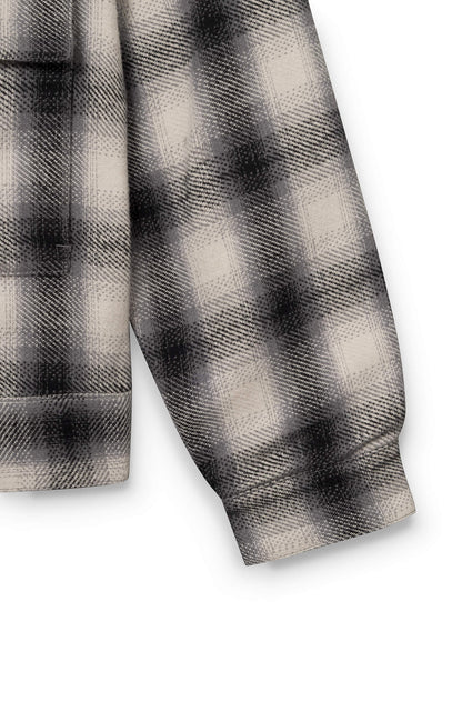 Manche de la veste en coton avec motif à damier blanc et noir pour homme